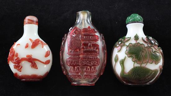 Three Chinese overlaid glass snuff bottles, 1850-1940, Richards no.s 277, 402 and 405